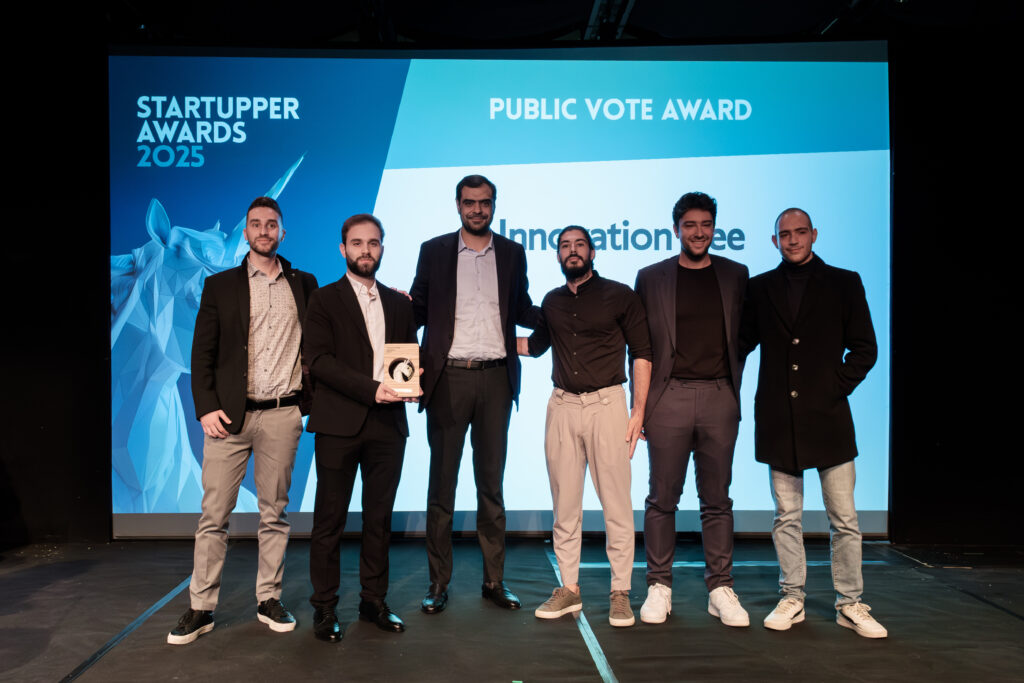 Innovation Bee team receiving the Public Vote Award at Startupper Awards 2025